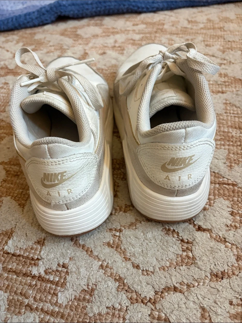 Nike off-white and beige low-top sneakers